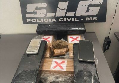 Imagem da notícia Durante caça a suspeito de feminicídio, polícia flagra mulher com 7,5 kg de maconha em MS